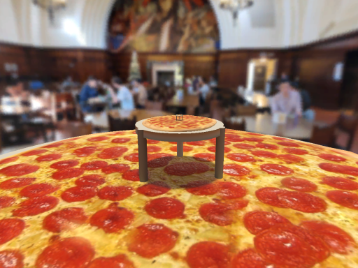 The Little Table That Comes On Top Of Pizza